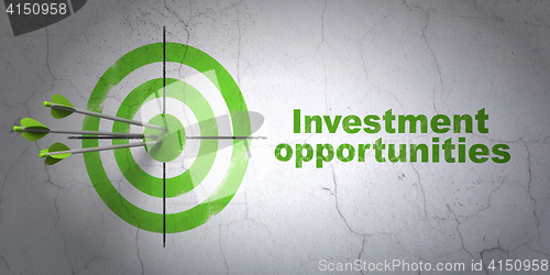 Image of Finance concept: target and Investment Opportunities on wall background