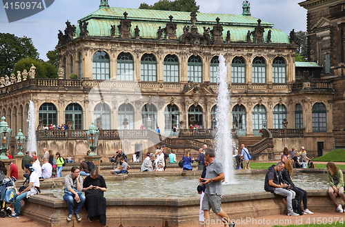 Image of DRESDEN, GERMANY – AUGUST 13, 2016: Tourists walk and visit Dr