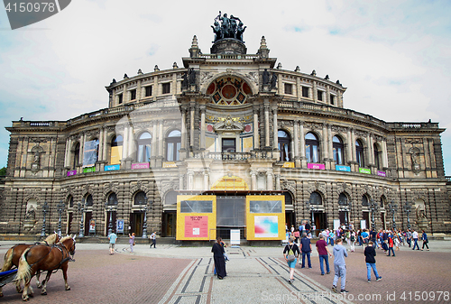 Image of DRESDEN, GERMANY – AUGUST 13, 2016: Tourists walk and visit on