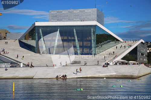 Image of OSLO, NORWAY – AUGUST 17, 2016: Tourist on the Oslo Opera Hous