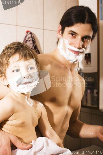 Image of Portrait of son and father enjoying while shaving together, lifestyle people concept, happy family