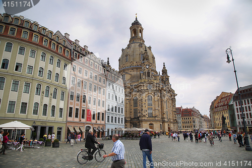 Image of DRESDEN, GERMANY – AUGUST 13, 2016: People walk on Neumarkt Sq