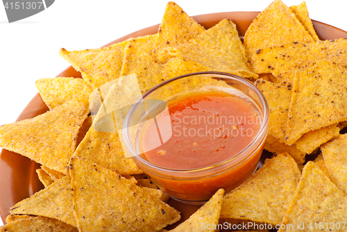 Image of Plate of freshly made spicy nachos with salsa