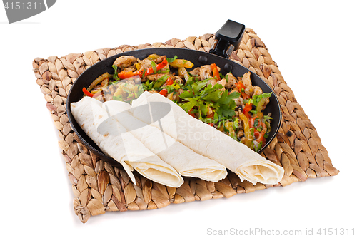 Image of traditional mexican beef fajitas with tortillas