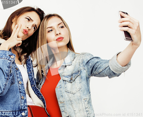 Image of best friends teenage girls together having fun, posing emotional on white background, besties happy smiling, lifestyle people concept
