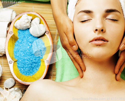 Image of stock photo attractive lady getting spa treatment in salon