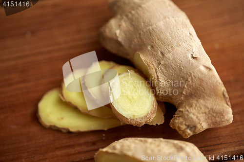 Image of close up of ginger root on wooden table