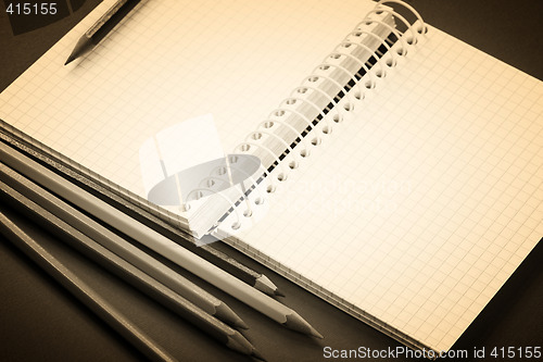 Image of Pencil and agenda