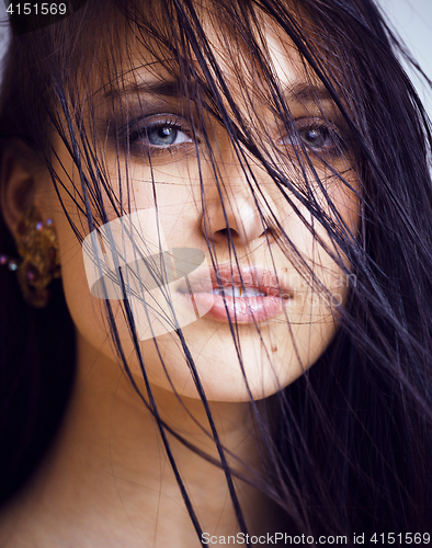 Image of beauty young brunette sad woman close up,real spa