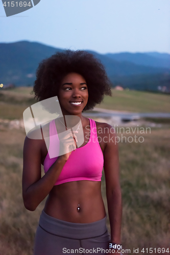 Image of young black woman in nature