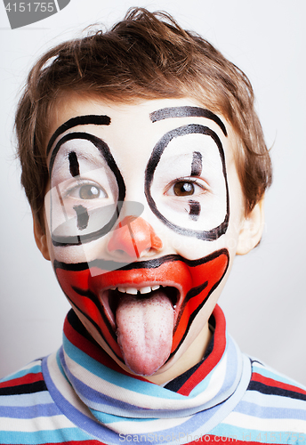 Image of little cute real boy with facepaint like clown, pantomimic expre