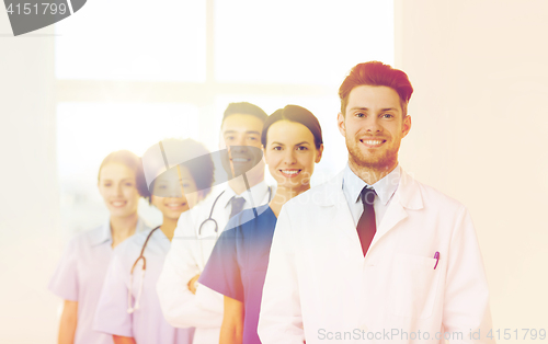 Image of group of happy doctors at hospital