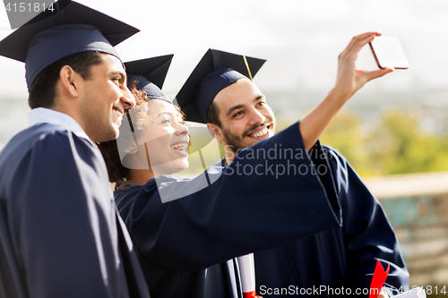 Image of students or bachelors taking selfie by smartphone