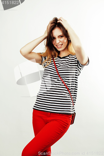 Image of young pretty stylish hipster girl posing emotional isolated on white background happy smiling cool smile, lifestyle people concept