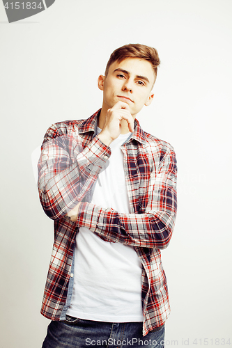 Image of young handsome teenage hipster guy posing emotional, happy smiling against white background isolated, lifestyle people concept