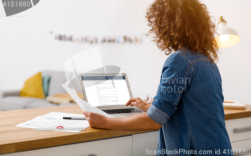 Image of Woman working at the office