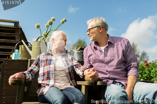 Image of happy senior couple at summer farm