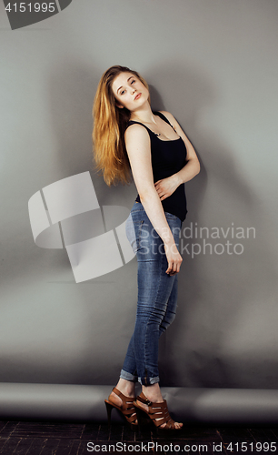 Image of cute young pretty girl thinking happy smiling on white background, lifestyle people concept