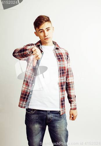 Image of young handsome teenage hipster guy posing emotional, happy smiling against white background isolated, lifestyle people concept