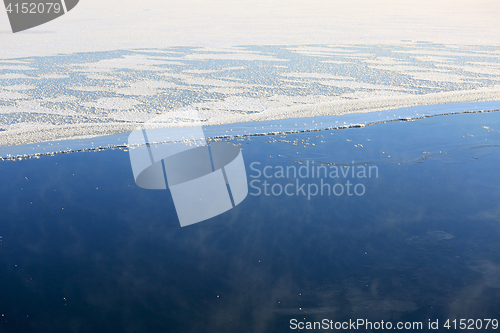 Image of Background of Vaporizing, Freezing Blue Sea