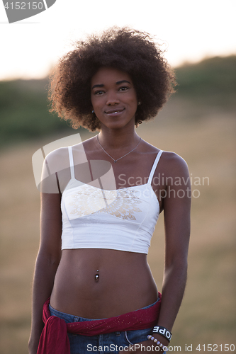 Image of young black woman in nature