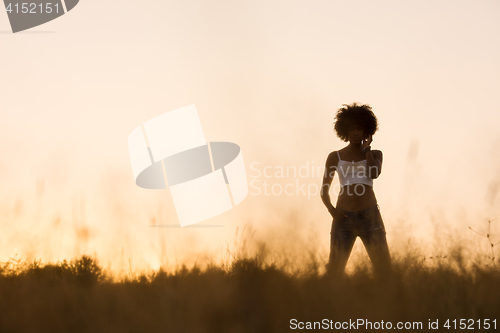 Image of young black woman in nature