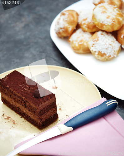 Image of Chocolate cake and eclairs
