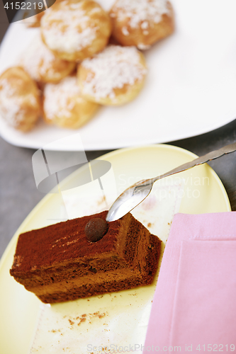 Image of Chocolate cake and eclairs