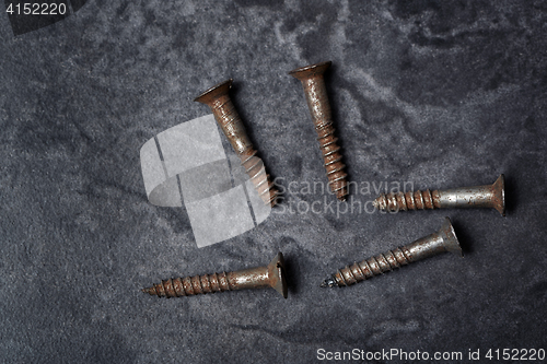 Image of Group of rusty screws