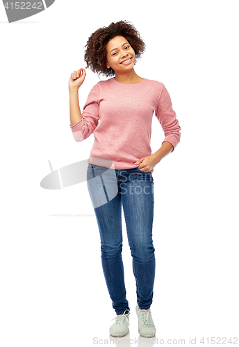 Image of happy african american young woman over white