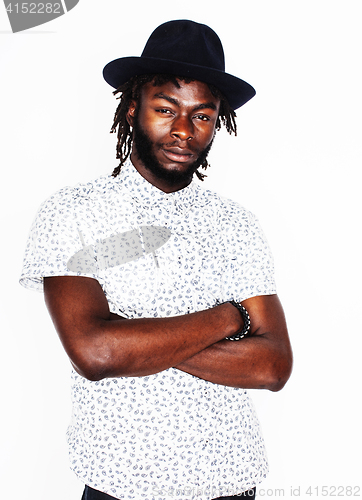 Image of young handsome afro american boy in stylish hipster hat gesturin