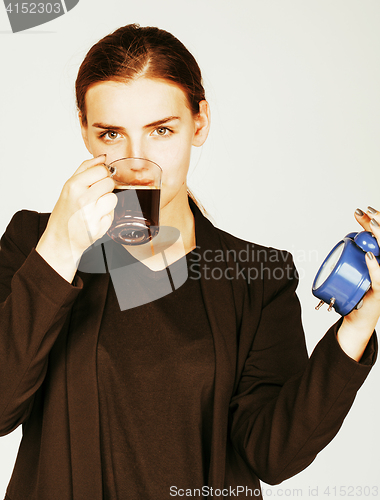 Image of young beauty woman in business style costume waking up for work 