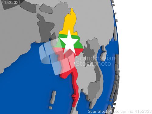 Image of Myanmar on globe with flag