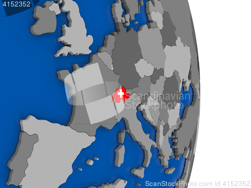 Image of Switzerland on globe with flag