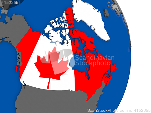 Image of Canada on globe with flag