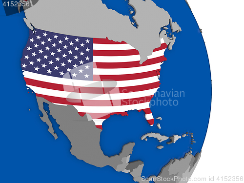 Image of USA on globe with flag