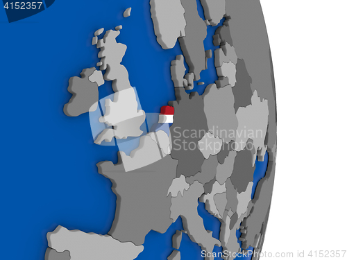 Image of Netherlands on globe with flag