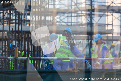 Image of Team of construction worker on construction site.