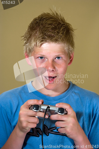 Image of Boy playing a video game