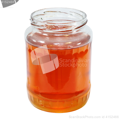 Image of jar of honey on white background