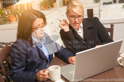 Image of Businesswomen Working on the Laptop