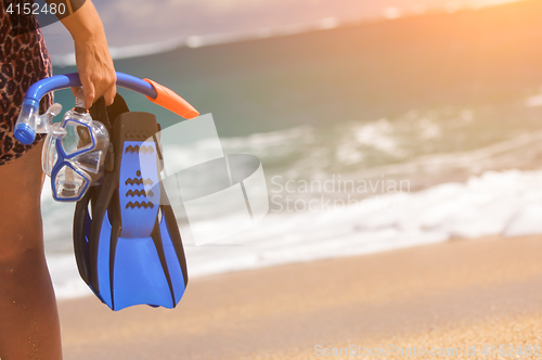 Image of Woman Holding Snorkeling Gear