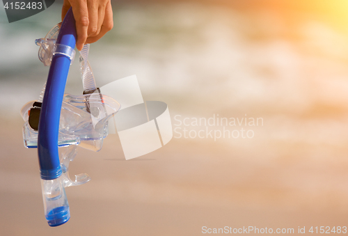 Image of Woman Holding Snorkeling Gear