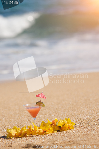 Image of Tropical Drink on Beach Shoreline