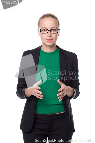 Image of Business woman standing with arms crossed against white background..