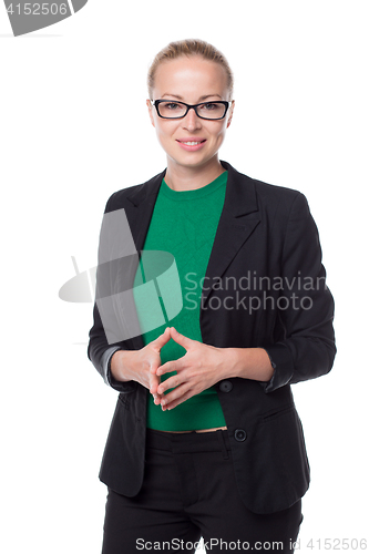 Image of Business woman standing with arms crossed against white background..