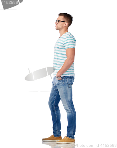 Image of young man in eyeglasses over white