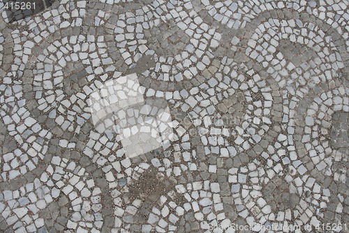 Image of Mosaikk on sidewalk