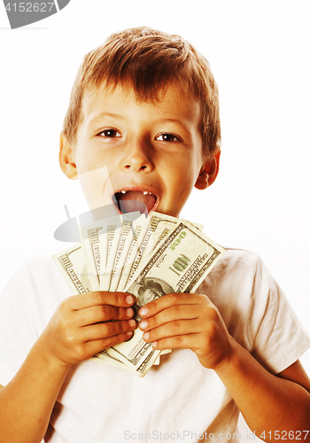 Image of young cute boy holding lot of cash, american dollars isolated