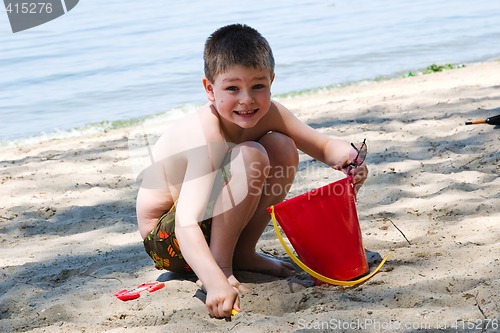 Image of Playing in the sand